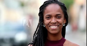 African woman smiling. Portrait black lady smile at camera