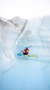 You must experience this at least once in your life 🧊🛶👇🏻 . 📍Paddle boarding on the Knik Glacier with @alaskahelicoptertours, located near Palmer about an hour from Anchorage, Alaska. This is one of the most surreal glacier experiences you can have in the US . 🚁 You’ll start with a scenic helicopter ride before landing right on the Knik Glacier. From there, it’s up to you: spend your time paddle boarding around glowing blue pools, exploring ice caves, swimming (yes, really), or hiking acros