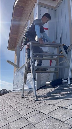 Installing vinyl board and batten on a roof.