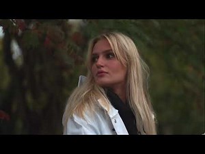 White Retro Raincoat on a rainy day