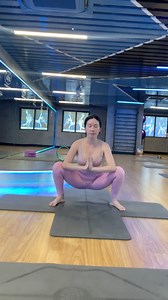 Malasana, also known as Garland Pose or Yoga Squat, is a deep squatting yoga pose that stretches the hips, ankles, and thighs, and stimulates the digestive system. It's a grounding and strengthening pose that can improve flexibility and posture | Master Yoga 2.0