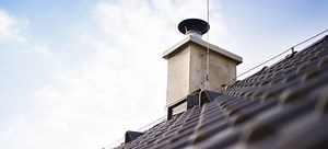 Painting a Metal Chimney Cap | DoItYourself.com