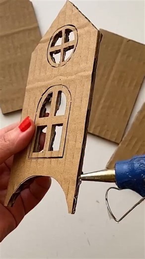 Pooja Crafts on Instagram: "🏡✨ Tiny hut, big creativity! Watch how a simple piece of cardboard transforms into a cozy little hut. Perfect DIY for craft lovers! ♻️🎨 #CardboardCraft #DIYCrafts #PaperHut --- #PaperCraft #CardboardHut #DIYCardboard #MiniatureCraft #CraftReels #ArtFromWaste #DIYIdeas #RecycledArt #CreativeReels #CraftWithMe #PapercraftLovers #TinyHouseCraft #UpcycledCraft #CraftingInspo #HandmadeMiniatures"