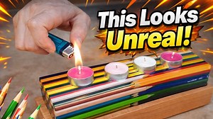 This DIY candle holder made from colored pencils looks unreal