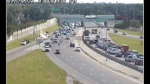 Dump truck driver loses control, brings down I-10 sign; 2 sent to hospital