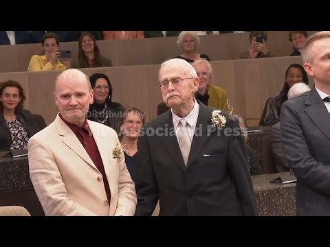 Same sex couples marry in Amsterdam as Dutch mark 25th anniversary of world's first gay weddings
