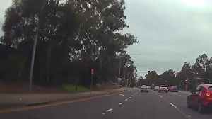 ⛔️🚗 Dangerous driver on Hoxton Park rd #HoxtonPark in a school zone. ❓ How many road rules can you dangerously break with one move? ℹ️ A community member sent this dashcam footage into us, showing a white VW Golf caught driving recklessly in a school zone, just before school started. The incident happened at the traffic/crossing lights right outside the Good Samaritan Catholic College in Hinchinbrook / Hoxton Park. 🚦 The golf driver was seen speeding through a school zone, he then drove straig