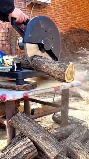 cutting wood logs with a circular saw while holding steady for straight clean cuts on workbench