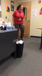 Student hides under desk and grabs teacher's ankle