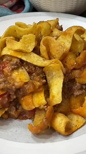 Looking for a delicious and easy dinner recipe that your whole family will love? Check out my step-by-step guide on how to make the best Frito Pie with ground beef! With crispy Fritos, savory ground beef, gooey cheese, and zesty tomatoes, this hearty casserole is the ultimate comfort food. Plus, it's perfect for game day snacks or party food that's sure to impress your guests. Don't miss out on this mouth-watering recipe that's guaranteed to become a family favorite! #linkincomments #FritoPie #G