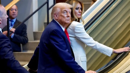 Melania, Trump step on escalator, it stops. Fuming White House demands probe