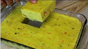 Cornmeal Cou Cou / Coo Coo 1 - 9x11 dish 2 cups yellow fine corn meal 2 1/2 cups water at room temp 2 tbsp unsalted butter 1/4 cup onions finely chopped 1/4 cup finely grated carrots 4 ochros finely chopped 1 tbsp minced garlic 3 pimentos chopped 2 scallions chopped 1/4 tsp salt 1/4 tsp black pepper 2 cups coconut milk | Trini cooking with Natasha