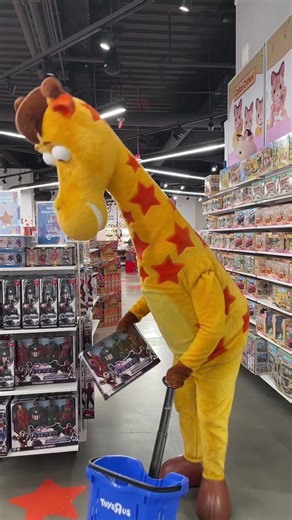 Exploring Toys R Us with Geoffrey the Giraffe