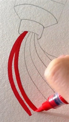 drawing several curved red lines on a white paper using a small manual red liquid ink marker pen