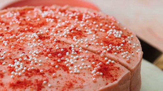 Now here's a dessert worthy of a celebration. Let's raise a glass to this Pink Champagne Cake—it's a super-fun, two-layer dessert that's easier to pull off than it might appear. 🥂 Save this recipe for a spur-of-the-moment dinner party: https://bit.ly/3b1rZxm | Southern Living