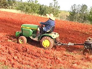 1982 John Deere 210 Garden Tractor (Harrowing Field)