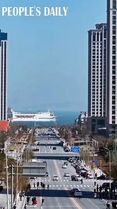 9.3K views · 274 reactions | A street that leads straight to the sea becomes a popular site in Dalian, northeast China’s Liaoning Province, creating a mesmerizing scene where the urban landscapes of the coastal city merge with the blue water while cruise ships sail in and out of the harbor. #BeautifulChina | VideoChina | Facebook