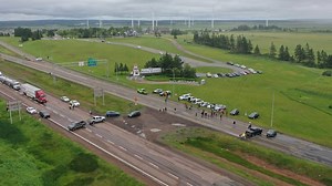 Protesters attempt to stop a truck from crossing the N.B.-N.S. border