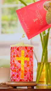 Elegance meets serenity with this stunning, handcrafted Pink Zebra stained glass simmering light symbolizing peace and renewal. Featuring a beautiful golden cross surrounded by vibrant red and pink hues, this piece casts a warm, peaceful glow. What Sprinkles will you be warming in the gorgeous Stained Glass Serenity Simmering Light? | Pink Zebra Home