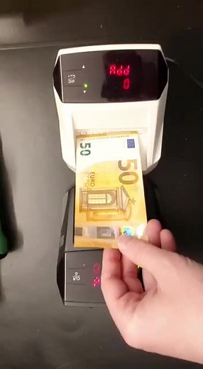 Counting 50 Euro Banknotes with Currency Machine