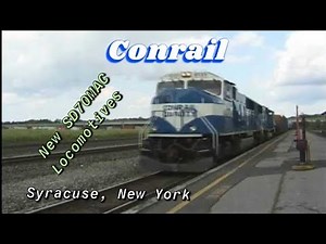Conrail westbound train with two New SD70MAC's at Syracuse, NY. 7-10-98. Time 1:30pm.