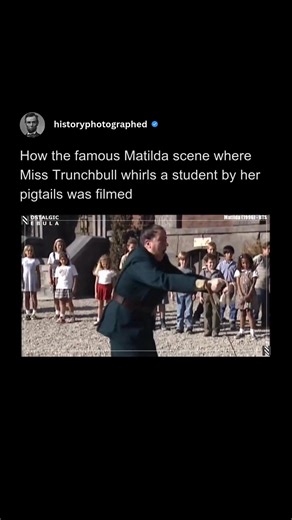 The infamous "pigtail hammer throw" scene from the 1996 movie Matilda, where Miss Trunchbull swings Amanda Thripp by her braids, was a blend of movie magic and physical stunt work. The young actress, Jacqueline Steiger, wore a full-body harness attached to a large crane, with the wires threaded through special prosthetic pigtails. The director, Danny DeVito, confirmed she loved being in the harness, and the precise, careful filming brought the incredible feat to life without CGI. | History In Pi