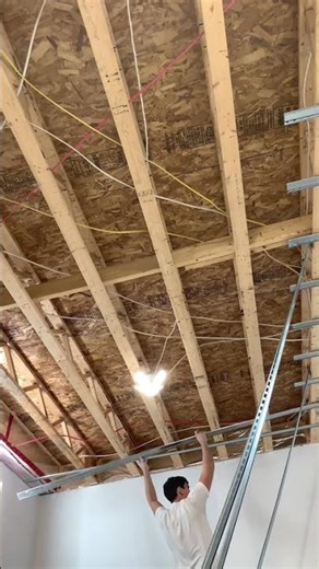 Resilient channel separates drywall from framing to reduce noise and vibration through ceilings.
