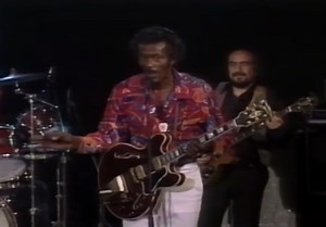 Chuck Berry - Brown Eyed Handsome Man (Live) (1956) In 1956, Chuck Berry wrote Brown Eyed Handsome Man—a joyful burst of rhythm that doubled as quiet rebellion. Beneath its bright humor lay a daring message: celebrating the beauty and confidence of a man of color in a segregated America. The idea struck Berry after witnessing a Latino man’s arrest outside a Los Angeles market. A woman in the crowd shouted, “Let him go—that’s a brown-eyed handsome man!” The phrase lingered, becoming the seed for 