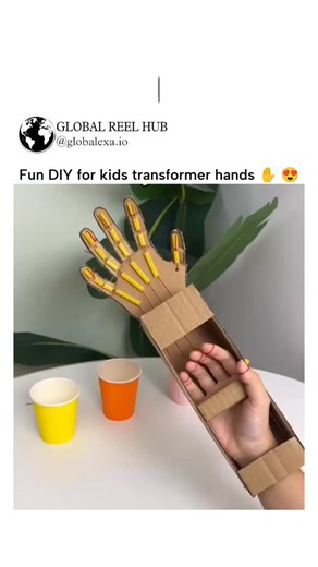 GLOBAL REEL HUB on Instagram: "This X post from @1_mincrafts features a 27-second video tutorial demonstrating a simple DIY "transformer hands" craft for kids, using cardboard, popsicle sticks, glue, and string to create movable finger puppets that mimic robotic gloves. Posted on November 23, 2025, the video has accumulated over 100,000 views and 2,500 likes, reflecting strong engagement from parents and educators seeking quick, low-cost activities that foster creativity and fine motor skills. T