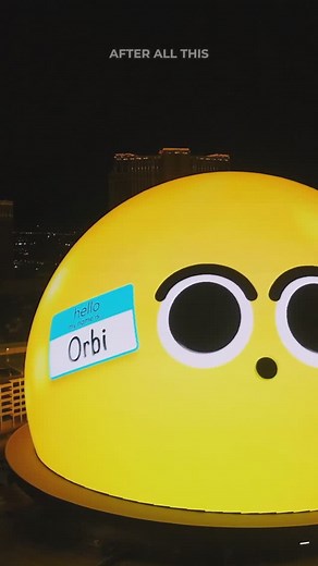 Vegas Navigator on Instagram: "🚨 BREAKING: The Sphere’s emoji face finally has a name - meet ORBI! 🤩 @spherevegas After becoming a Vegas icon, Orbi is now official with its own merchandise collection! Here’s what you need to know: • Orbi has been the face of the Sphere since its 2023 opening • Official merchandise just launched on shop.thesphere.com • Products include apparel, accessories and souvenirs • Items available for all ages (including “Adorbi” baby onesies!) • Select merchandise also
