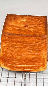 2.2M views · 4.1K reactions | 1000 layer bread  There’s no way layers of bread and butter doesn’t taste good 襤 Link to the recipe in my bio or here: https://zhangcatherine.com/thousand-layer-bread/ . . . #baking #croissant #recipe #dessert #bread #cube | Catherine.desserts | Facebook