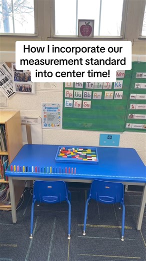 Integrating Measurement into Center Time 📏🚂 Explore how we make learning measurement standards engaging during Center time! Our unique approach involves taping a measuring tape to our table and providing students with a tray of dominoes. Watch as they place one domino at every inch mark, challenging themselves to see how long they can extend their domino train. This hands-on activity not only makes learning about inches fun but also enhances their understanding of measurement in a practical, e