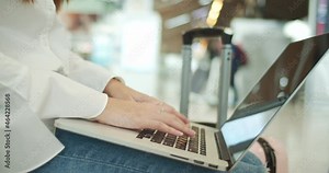 Close up of asian women using computer laptop at the airport