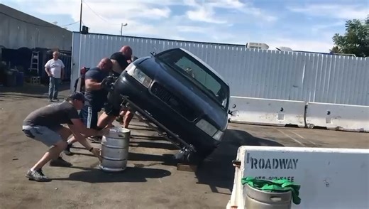 How many strongmen does it take to flip a car? 😅 | Brian Shaw