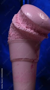 Chemical reaction in volumetric flask glass in laboratory. The chemical pink reagent in a transparent bottle. Chemical reaction