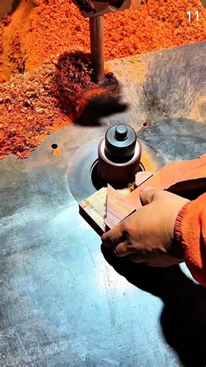 Routing decorative wood edge using table-mounted bit.