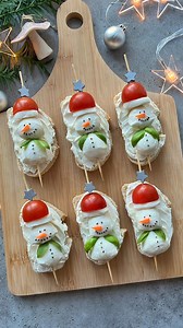 2.7M views · 12K reactions | Christmas Party Appetizers☃️ Deliciously festive slices of baguette topped with cream cheese and bocconcini, tomato & basil snowmen. The perfect Christmas Party food!! For more holiday inspiration, head to my website food-bites.com #holidayrecipes #christmasfood #foodart #christmasparty #beautifulcuisines #appetizers | Foodbites | Facebook