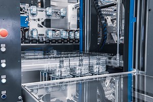 Versatile In-Mould-Label system - Brink Moulds & Automation