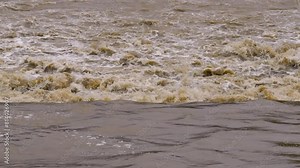 Footage of muddy and blurry flowing stream after rain and storm. Stock Video