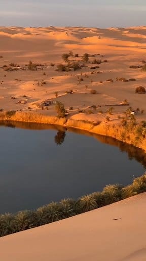 Lake ubari, Libya 🇱🇾 Hidden in the heart of the Sahara lies a miracle Lake Ubari, A serene oasis surrounded by golden dunes, where silence meets beauty. Caché au cœur du Sahara se trouve un miracle le lac Ubari Une oasis paisible entourée de dunes dorées, où le silence rencontre la beauté. #africa #Libya #lakelife #sahara | Muhammad Hussaini