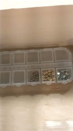 Arranging my fly tying box.