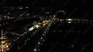 Aerial video, drone view. Panoramic night view of the sea port of Sveti Vlas in Bulgaria. Summer holidays in Europe