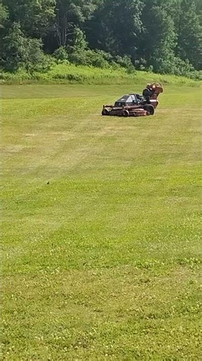 at a school equipment conference! automative lawn mowers!!!!!