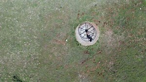 Aerial view of rotating roundabout seen from directly above
