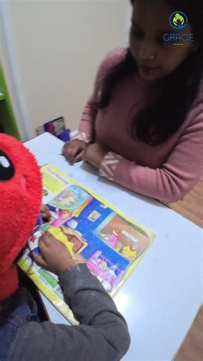 Grace Autism Center on Instagram: "Curiosity Turns Into Communication 💬 Every question is a step toward better communication 💬📘 Guided book reading helps children build language, vocabulary, attention, and confidence. This simple interaction between a child and therapist turns curiosity into learning and growth. ✨ Learning through connection ✨ Communication through play ✨ Confidence through conversation child learning speech therapy book reading activity language development early interventio