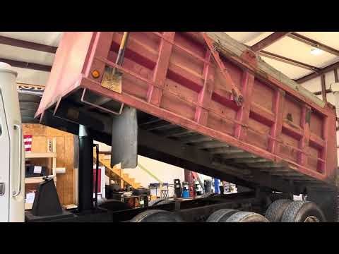 1997 VOLVO TRI-AXLE DUMP TRUCK - SOMERVILLE, TN 1200 For Sale