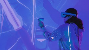 Gamer with VR glasses and controllers playing - Free Stock Video