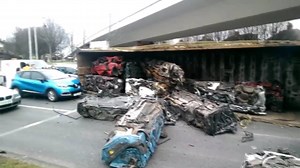 59K views · 146 reactions | Dramatic footage from the Liverpool Echo of the aftermath of a collision between two lorries, one of them was carrying scrap cars. The incident happened just after midday at the junction of Bowring Park Road and Queens Drive. Police say there are no reports of injuries | BBC Manchester | Facebook