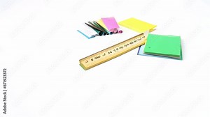 A 3D video introduction showcasing a variety of educational resources, including textbooks and school supplies, is presented on a white background for kindergarten and primary school students.