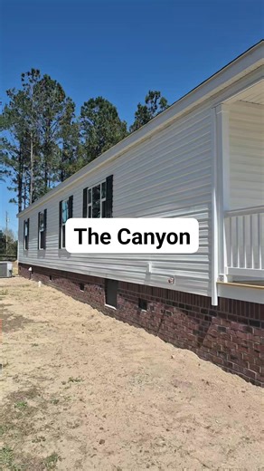 Beautiful front porch model. The Canyon by Rockwell. This model comes in either a 2 or 3 bedroom layout, fully drywalled with stainless steel applainces and large eat at island. Want one for yourself? Call, click of visit! ☎️ 843-347-2882 💻 www.claytonhomesofmyrtlebeach.com 🚗 2493 HWY 501E Conway SC | Clayton Homes of Conway - S. Carolina